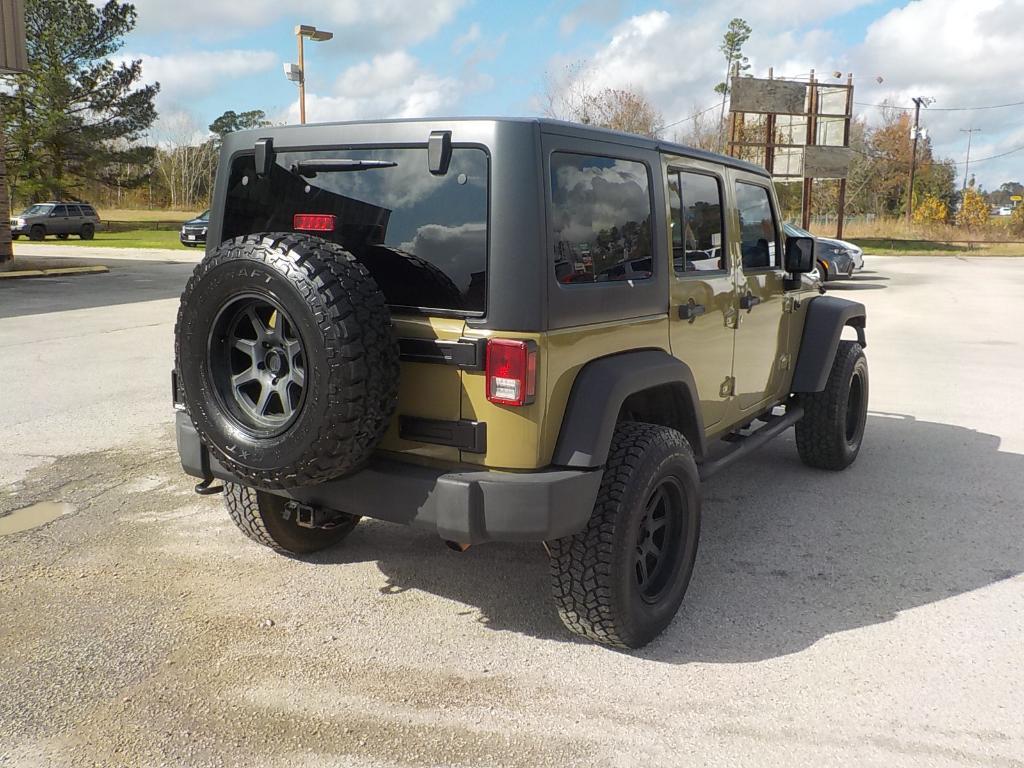 used 2011 Jeep Wrangler Unlimited car, priced at $12,995