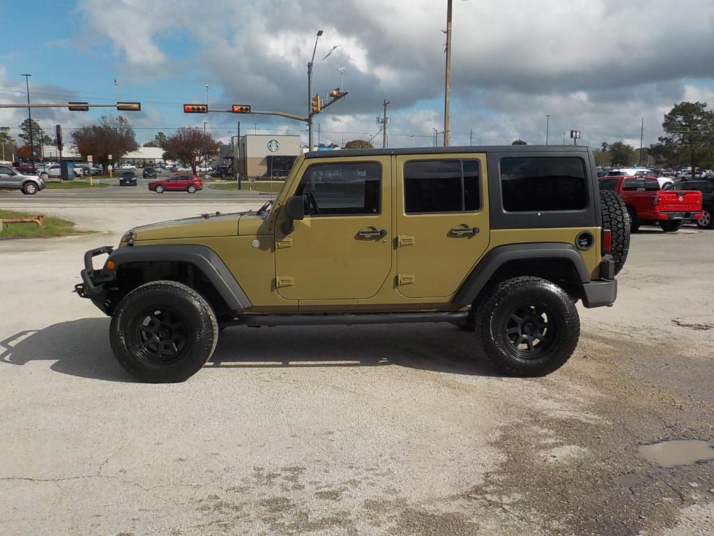 used 2011 Jeep Wrangler Unlimited car, priced at $12,995