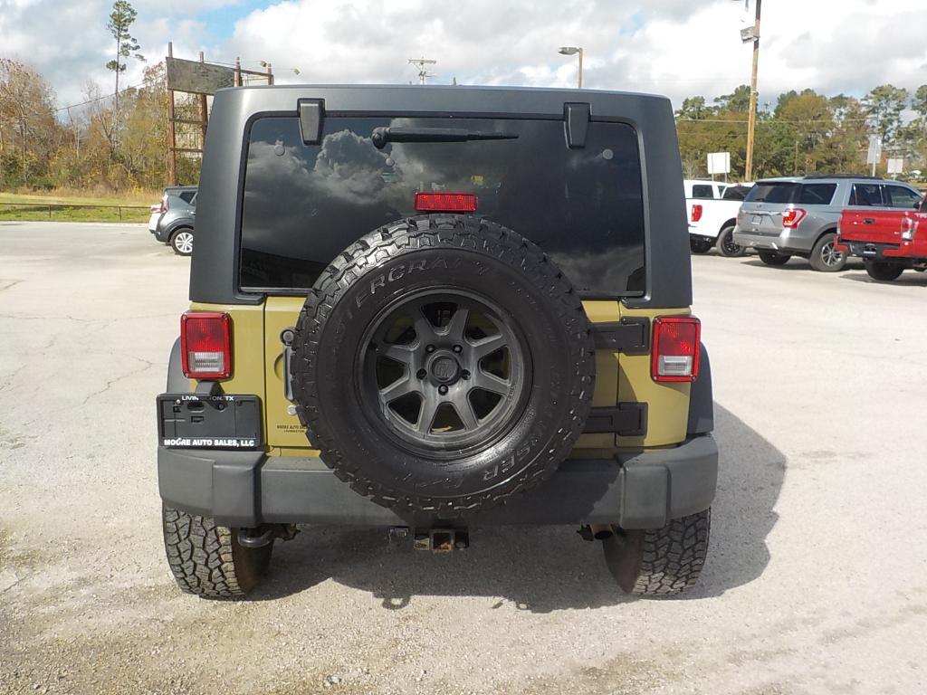 used 2011 Jeep Wrangler Unlimited car, priced at $12,995