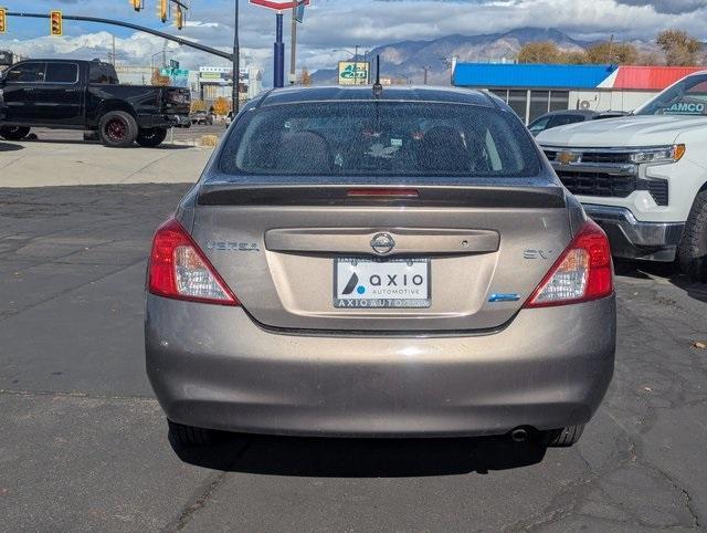 used 2014 Nissan Versa car, priced at $5,988