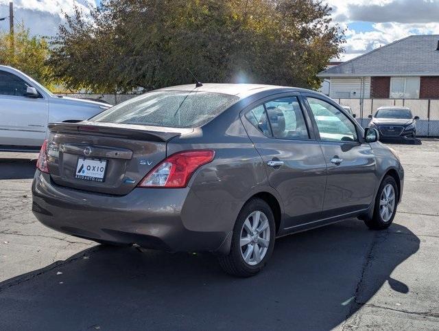 used 2014 Nissan Versa car, priced at $5,988