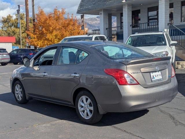 used 2014 Nissan Versa car, priced at $5,988