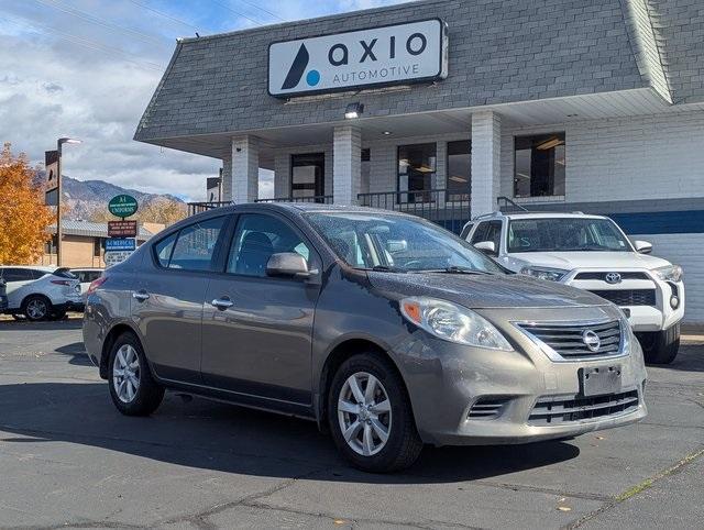 used 2014 Nissan Versa car, priced at $5,988