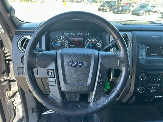used 2014 Ford F-150 car, priced at $11,000