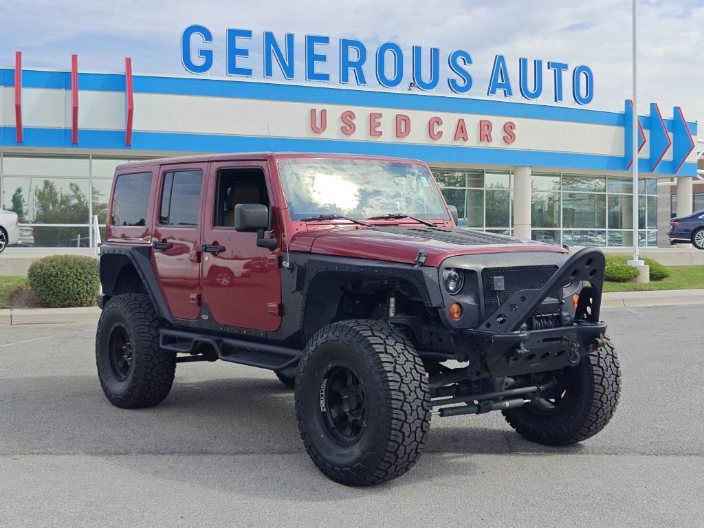used 2013 Jeep Wrangler Unlimited car, priced at $21,180