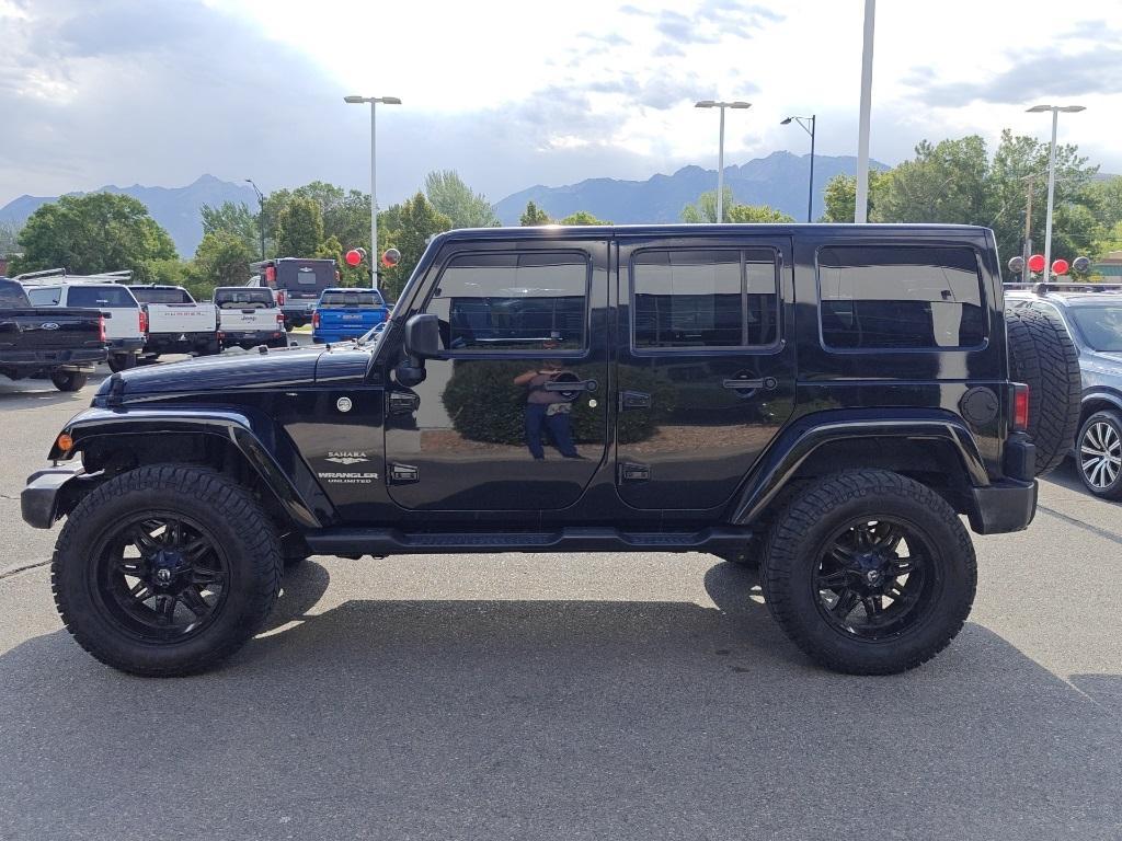 used 2015 Jeep Wrangler Unlimited car, priced at $18,450