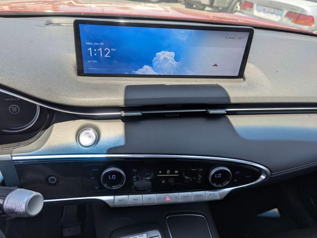 used 2023 Genesis GV70 car, priced at $34,288