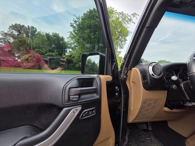 used 2014 Jeep Wrangler Unlimited car, priced at $21,995