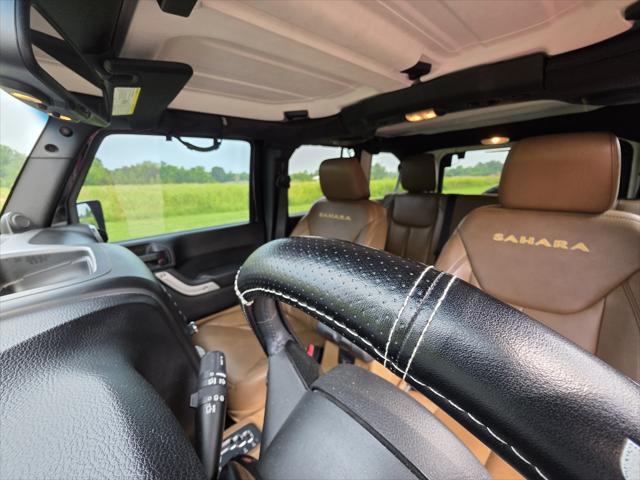 used 2014 Jeep Wrangler Unlimited car, priced at $21,995
