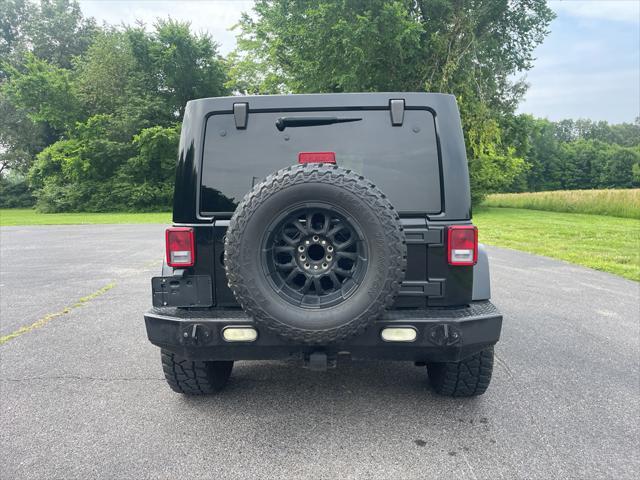 used 2014 Jeep Wrangler Unlimited car, priced at $21,995