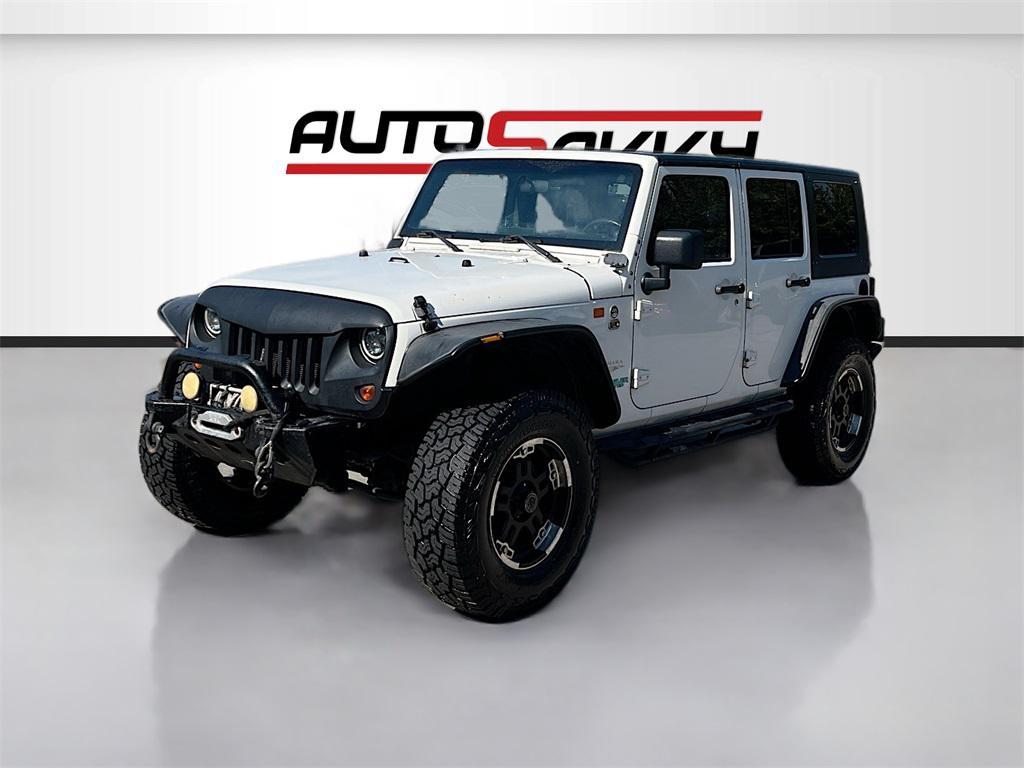 used 2010 Jeep Wrangler Unlimited car, priced at $11,000