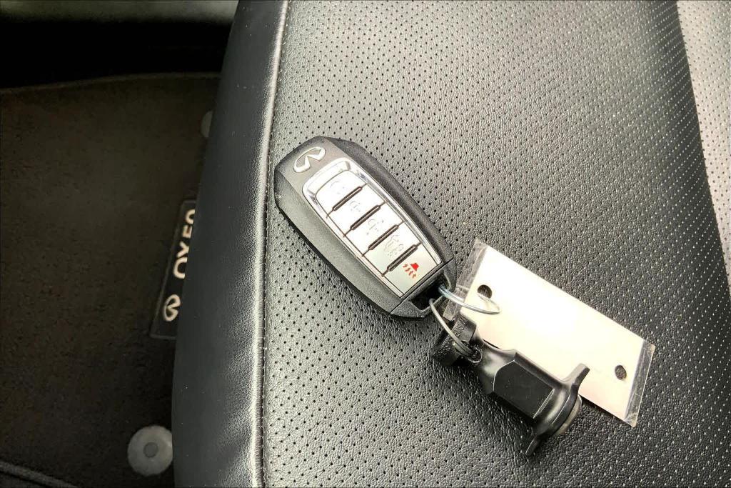 used 2024 INFINITI QX50 car, priced at $28,561