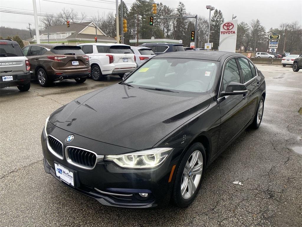 used 2018 BMW 330 car, priced at $21,034