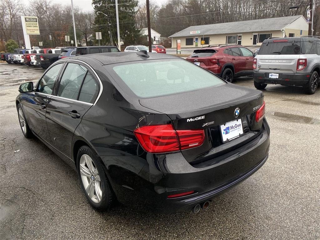 used 2018 BMW 330 car, priced at $21,034