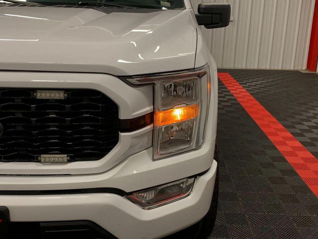 used 2021 Ford F-150 car, priced at $25,324