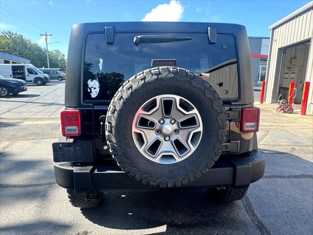 used 2017 Jeep Wrangler Unlimited car, priced at $25,335