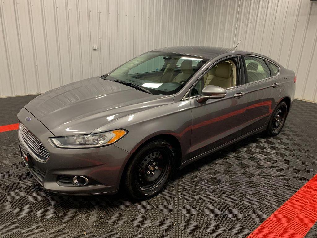 used 2014 Ford Fusion car, priced at $5,000
