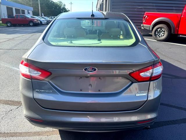 used 2014 Ford Fusion car, priced at $6,896