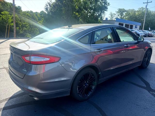 used 2014 Ford Fusion car, priced at $6,896