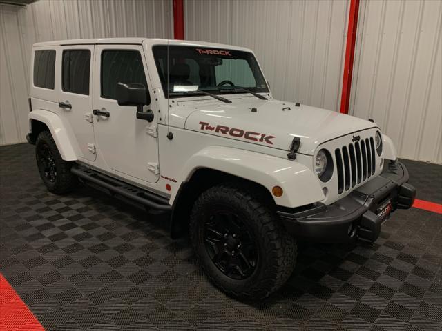 used 2016 Jeep Wrangler Unlimited car, priced at $26,879