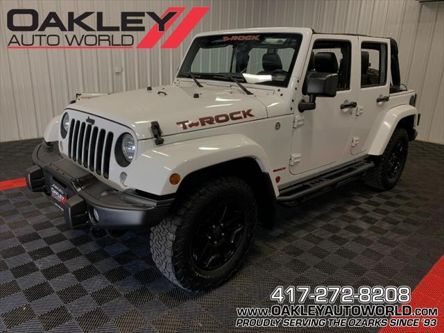 used 2016 Jeep Wrangler Unlimited car, priced at $25,897