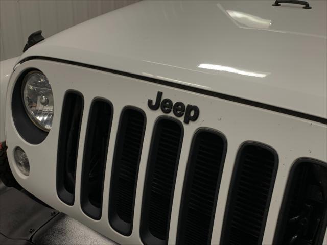 used 2016 Jeep Wrangler Unlimited car, priced at $26,879