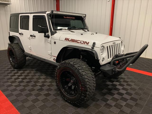 used 2016 Jeep Wrangler Unlimited car, priced at $36,405