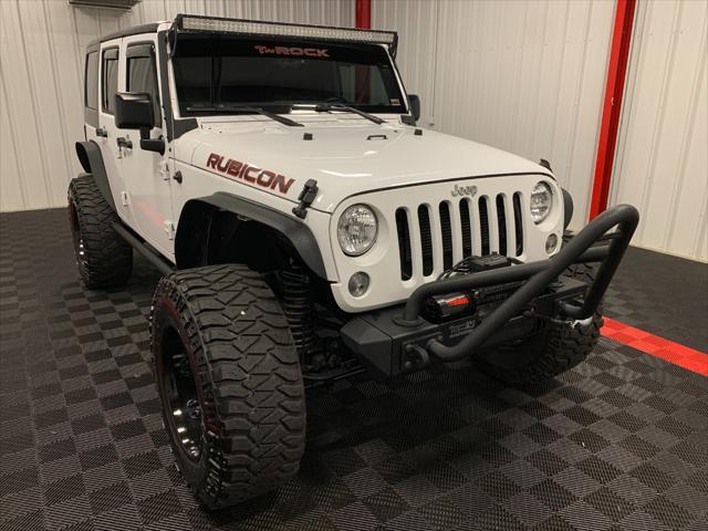 used 2016 Jeep Wrangler Unlimited car, priced at $36,405