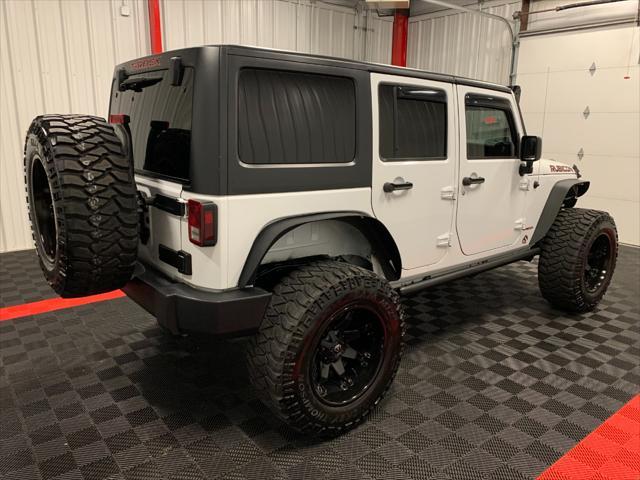 used 2016 Jeep Wrangler Unlimited car, priced at $36,405