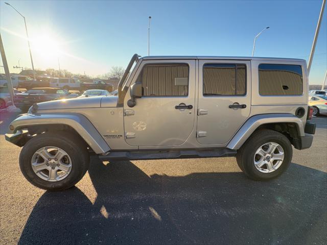 used 2014 Jeep Wrangler Unlimited car, priced at $17,968