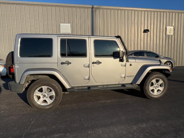 used 2014 Jeep Wrangler Unlimited car, priced at $17,968