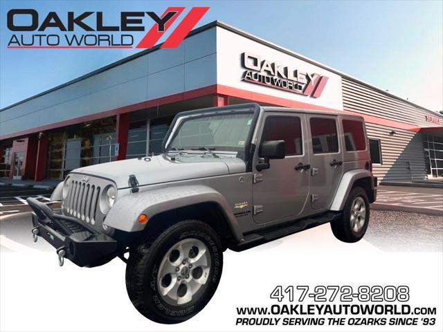 used 2014 Jeep Wrangler Unlimited car, priced at $17,139