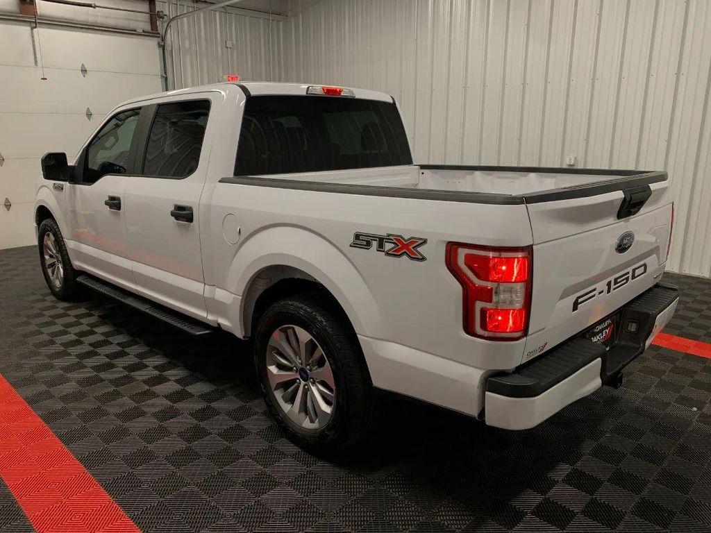 used 2018 Ford F-150 car, priced at $21,273
