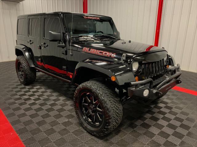 used 2013 Jeep Wrangler Unlimited car, priced at $24,052