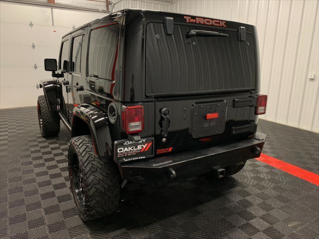 used 2013 Jeep Wrangler Unlimited car, priced at $24,052