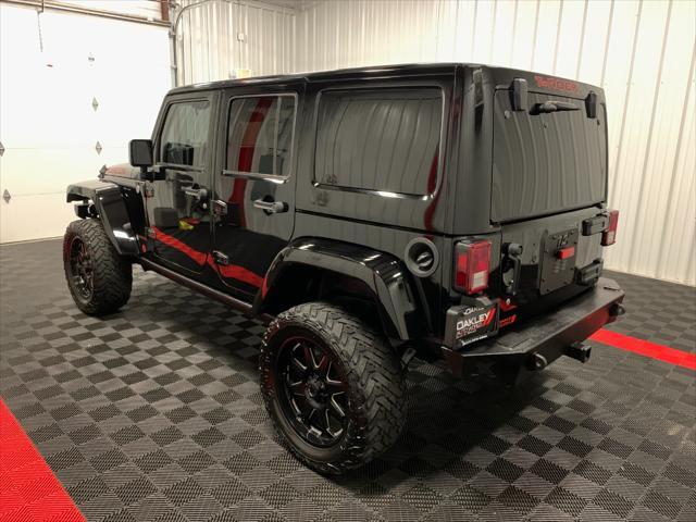 used 2013 Jeep Wrangler Unlimited car, priced at $24,052