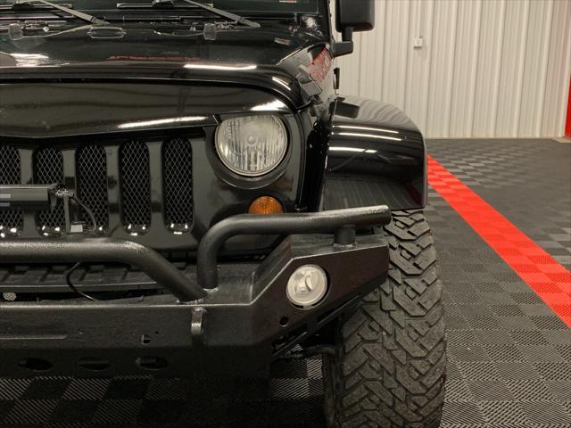 used 2013 Jeep Wrangler Unlimited car, priced at $24,052