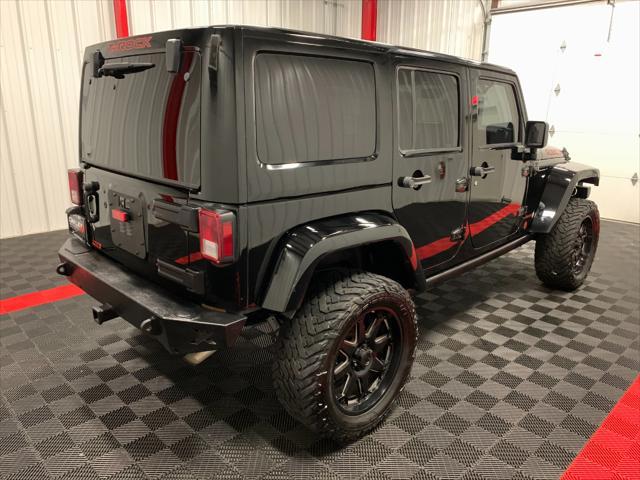 used 2013 Jeep Wrangler Unlimited car, priced at $24,052