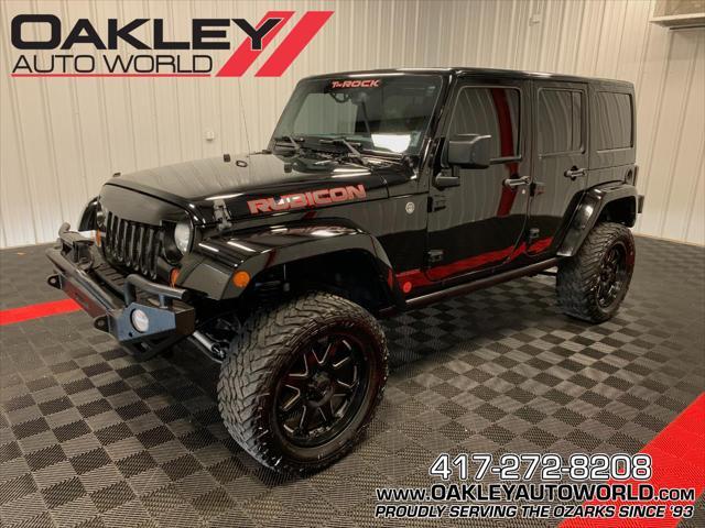 used 2013 Jeep Wrangler Unlimited car, priced at $24,052