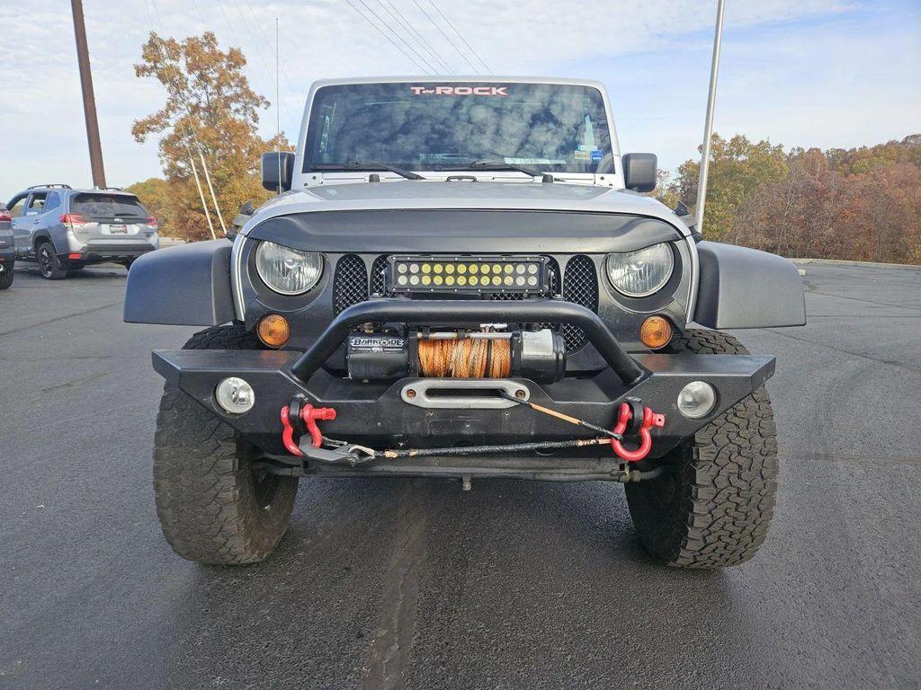 used 2011 Jeep Wrangler Unlimited car, priced at $15,070