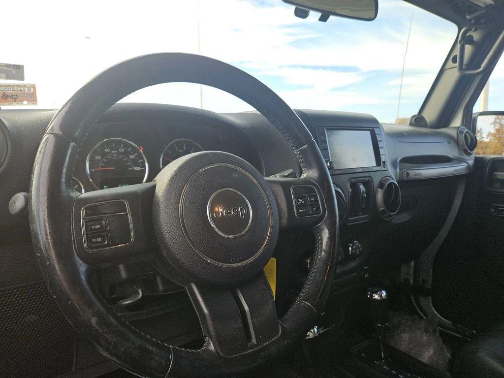 used 2011 Jeep Wrangler Unlimited car, priced at $15,070