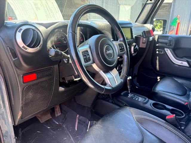 used 2015 Jeep Wrangler Unlimited car, priced at $18,164