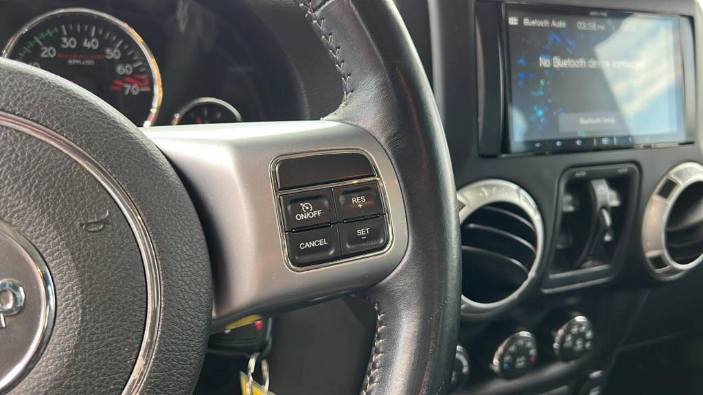 used 2014 Jeep Wrangler Unlimited car, priced at $19,900
