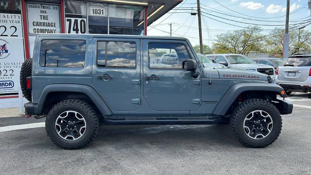 used 2014 Jeep Wrangler Unlimited car, priced at $19,900