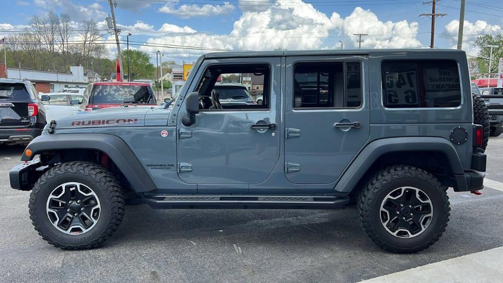 used 2014 Jeep Wrangler Unlimited car, priced at $19,900