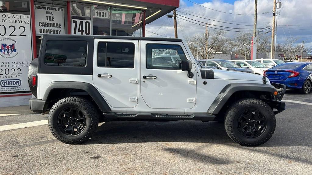 used 2016 Jeep Wrangler Unlimited car, priced at $14,900