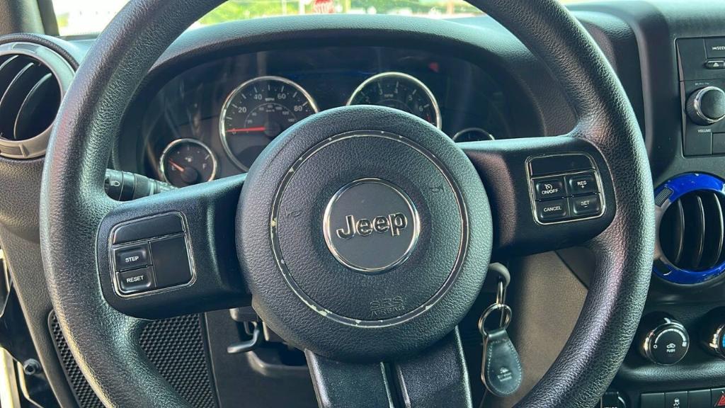 used 2015 Jeep Wrangler car, priced at $15,900