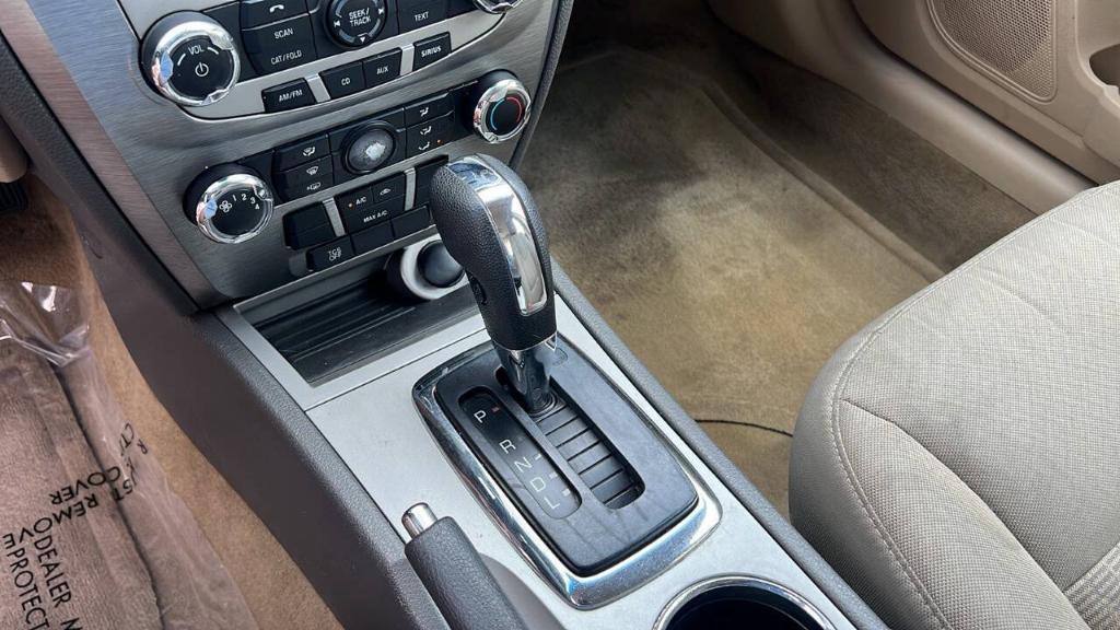 used 2012 Ford Fusion car, priced at $7,900