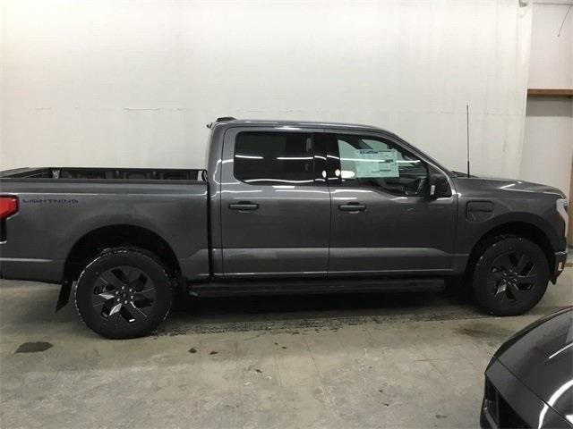 new 2023 Ford F-150 Lightning car, priced at $74,684