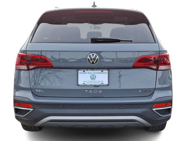 used 2022 Volkswagen Taos car, priced at $23,455